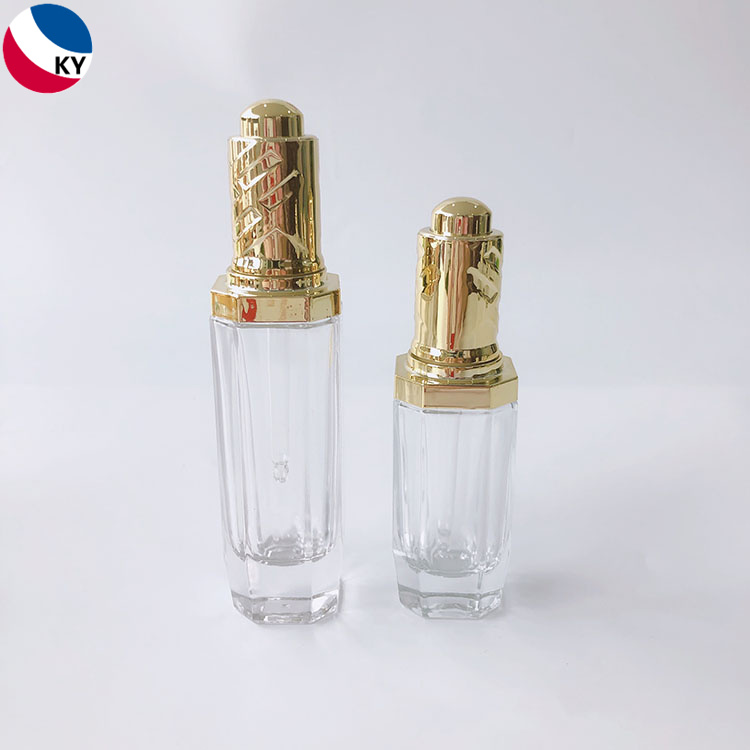 30ml 50ml Push Button Pump Transparent Thick Unique Glass Cosmetic Dropper Packaging Bottle with Gold Press Dropper