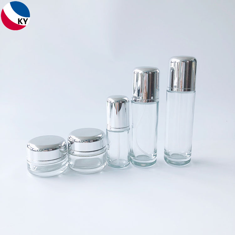 Luxury Round Bottom 30g 50g 30ml 50ml 100ml Cream Jar Round Cap Clear Glass Pump Bottle with Silver Pump packaging