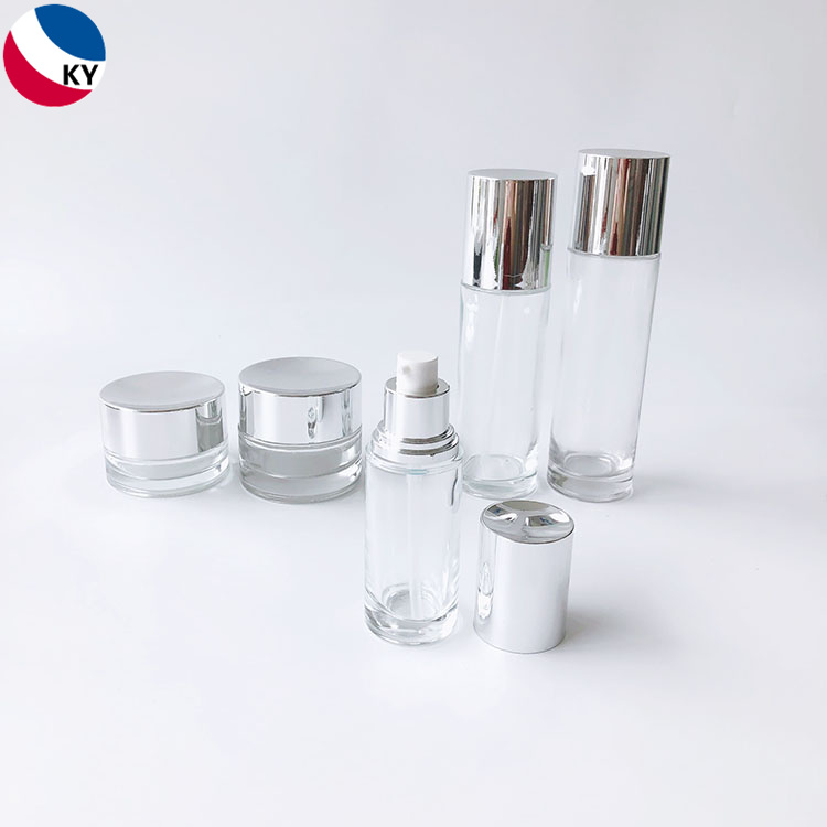 Luxury Cosmetic Packaging Sets Cylinder 30g 50g 30ml 50ml 100ml Cream Jar Clear Glass Pump Bottle with Silver Pump